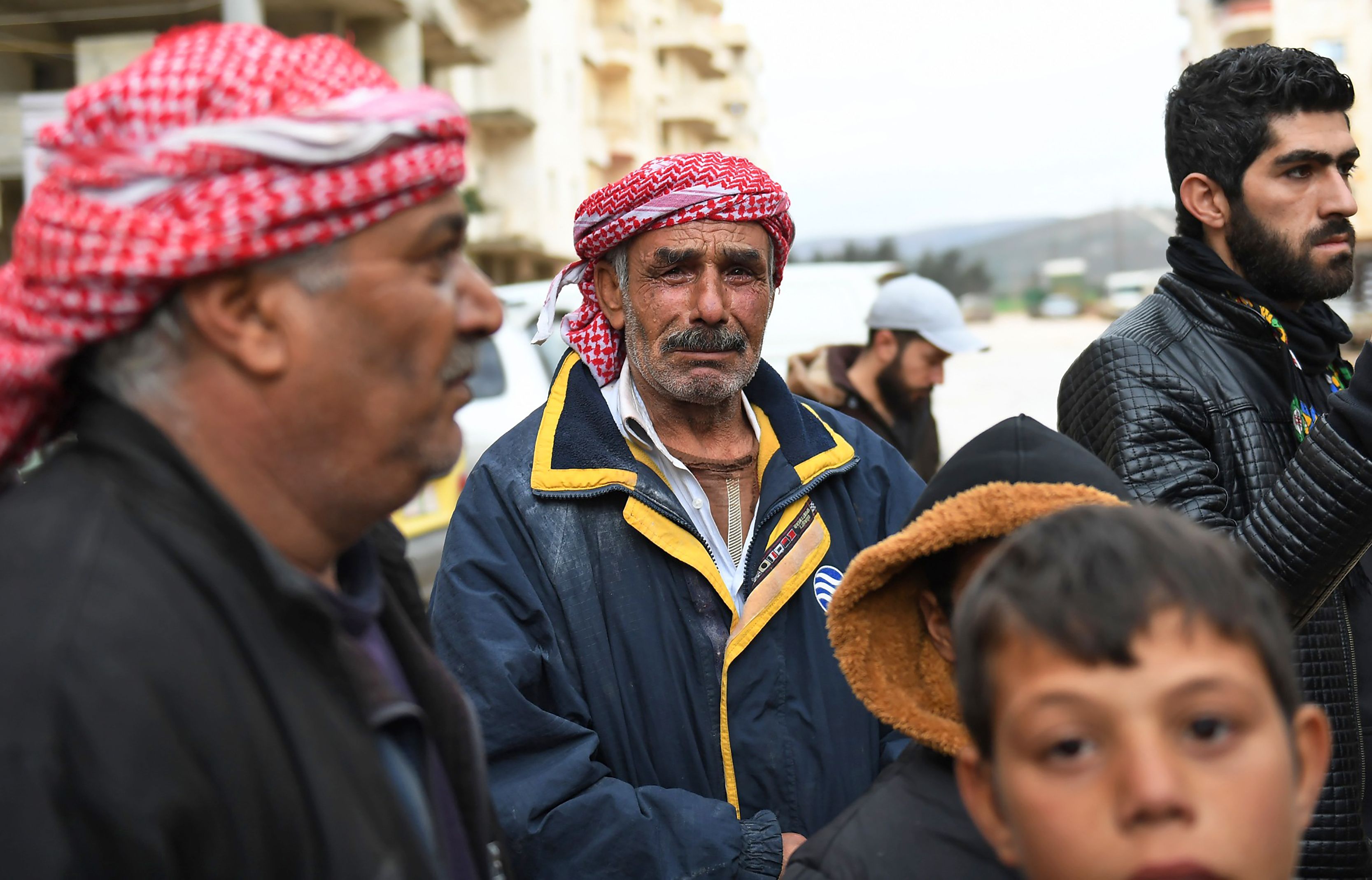 Syrians who fled Jandairis arrive in Afrin city Jan. 25.