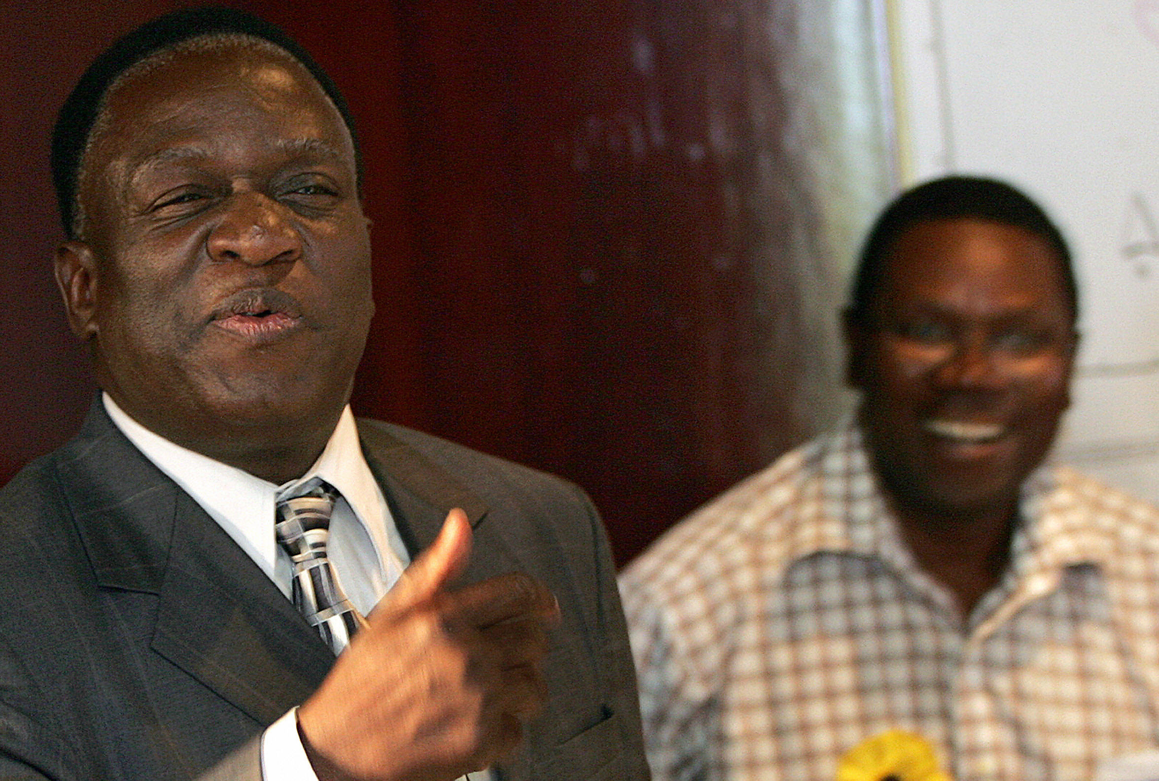 Zimbabwe's former vice president, Emmerson Mnangagwa, speaks at a key meeting on behalf of President Robert Mugabe in 2008.