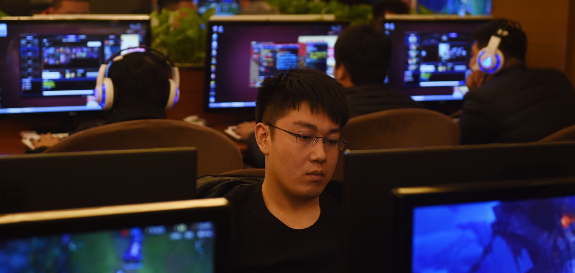 This photo shows gamers at an internet bar in Beijing. China's tight control of its citizens is mirrored in its locked-down internet.