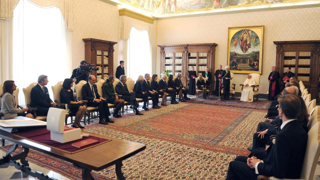 The pictures shows Italian President Sergio Mattarella speaking to Pope Francis during a visit at the Vatican. 
