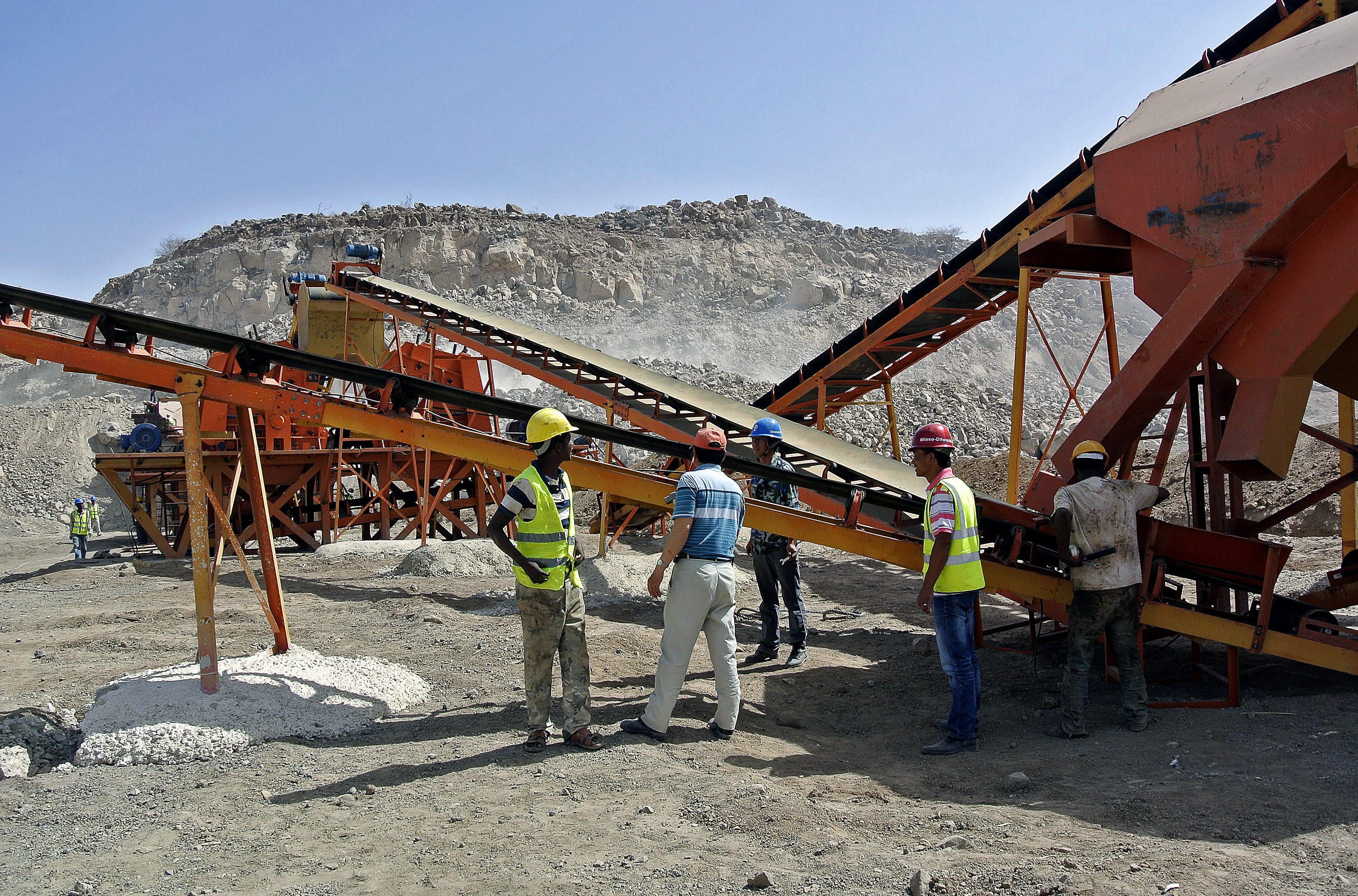 Employees work at a construction site for a new Chinese-built railway in Ethiopia on February 27, 2013. The new train line is one of eight new rail routes that will connect Ethiopia to neighboring countries, including Kenya, Sudan and South Sudan. 