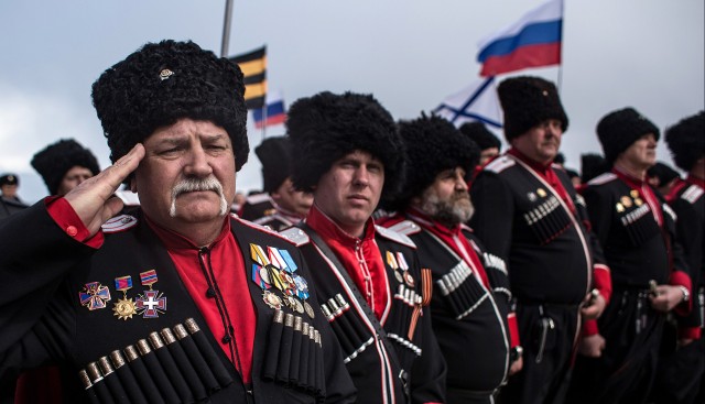 Cossacks stand near the 