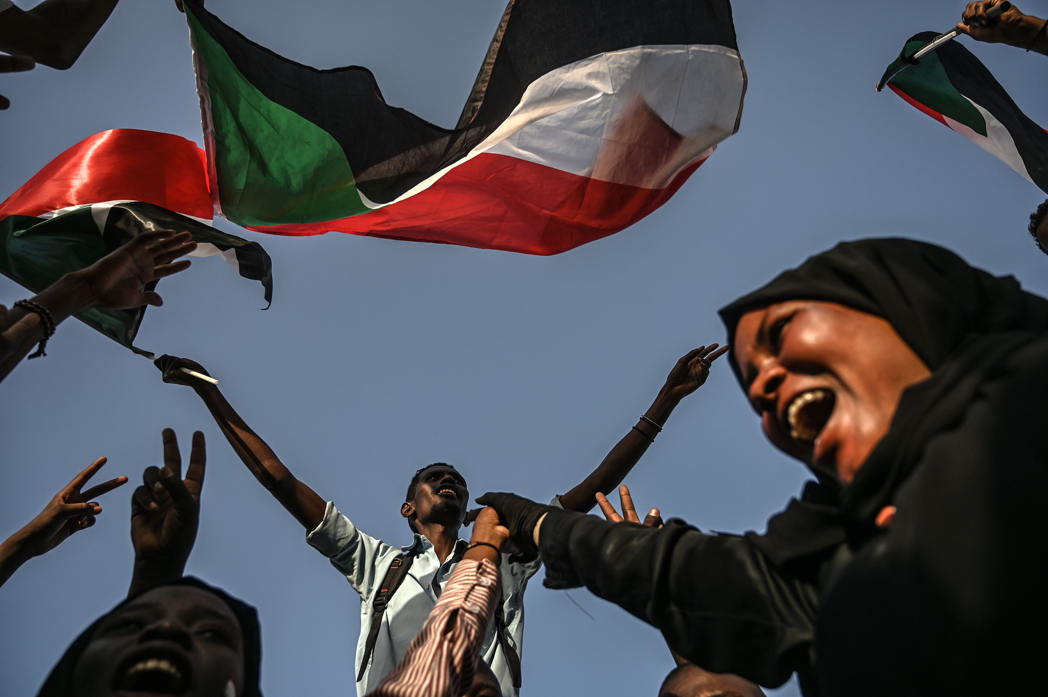 Sudanese citizens protest outside the military's headquarters in Khartoum on April 30, 2019 to push for a civilian-led transition after the ousting of President Omar al Bashir. 