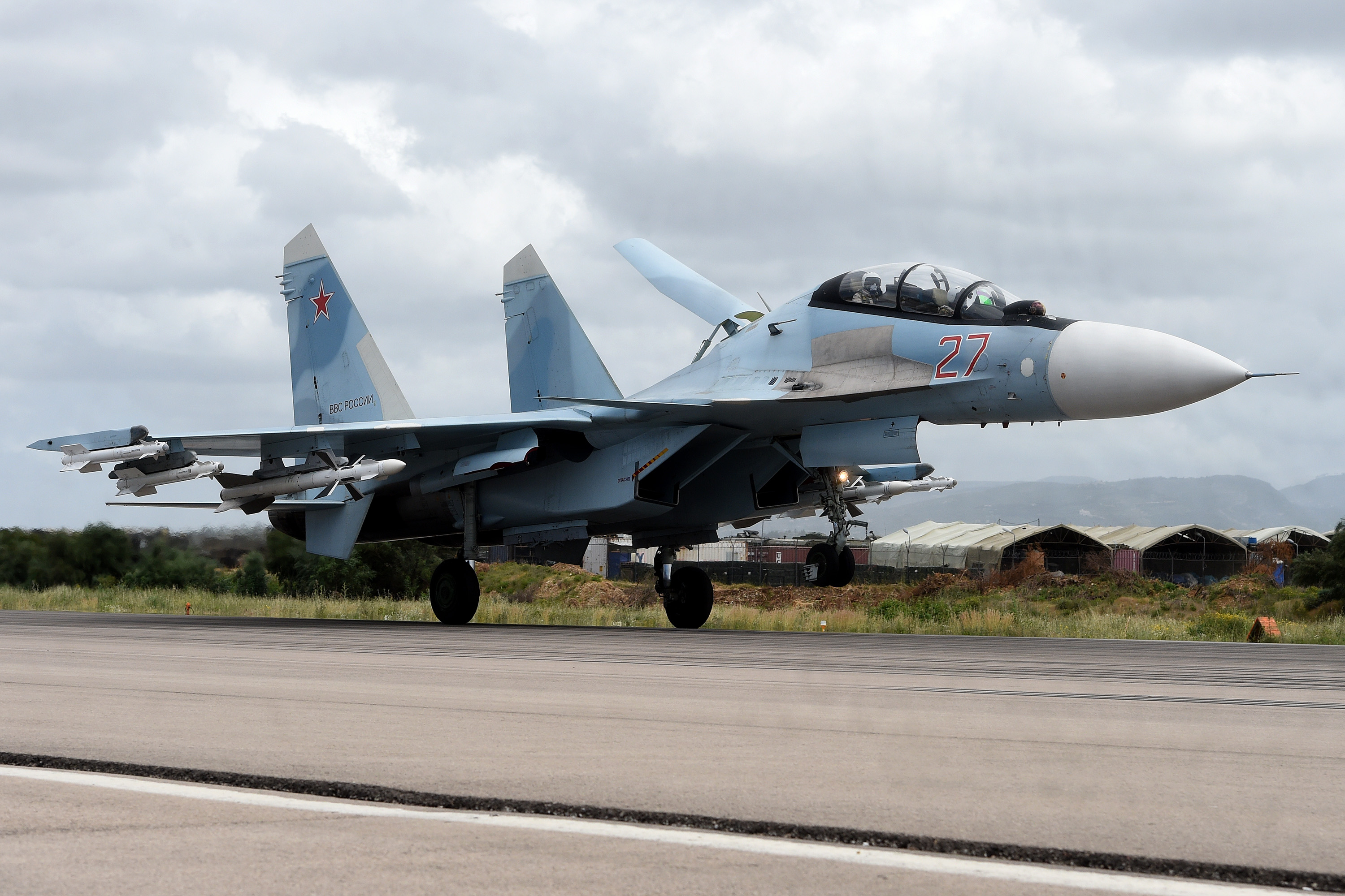A Russian Sukhoi Su-35 fighter lands at the Russian Hmeimim air base in Latakia province, in the northwest of Syria.
