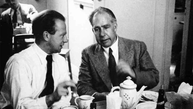 Werner Heisenberg and Niels Bohr speaking in 1934.