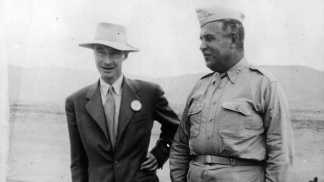 Nuclear physicist J. Robert Oppenheimer with Maj. Gen. Leslie Groves at the Trinity shot tower, from which an atom test bomb was ignited at Los Alamos, New Mexico.
