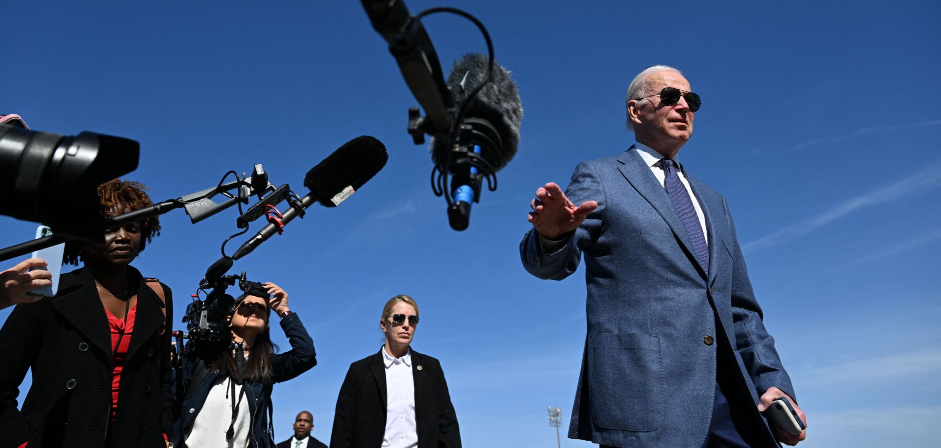 U.S. President Joe Biden speaks with the press before boarding Air Force One, as he departs for Northern Ireland, at Joint Base Andrews in Maryland on April 11, 2023.