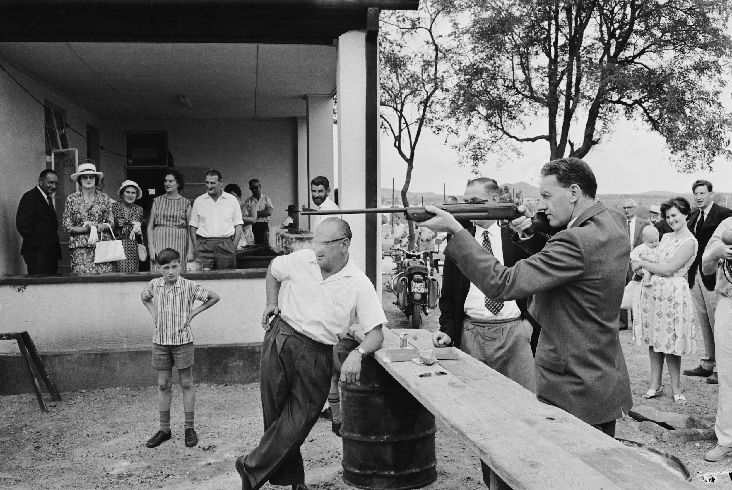 Rhodesian Prime Minister Ian Smith practices at a shooting range in 1964. 