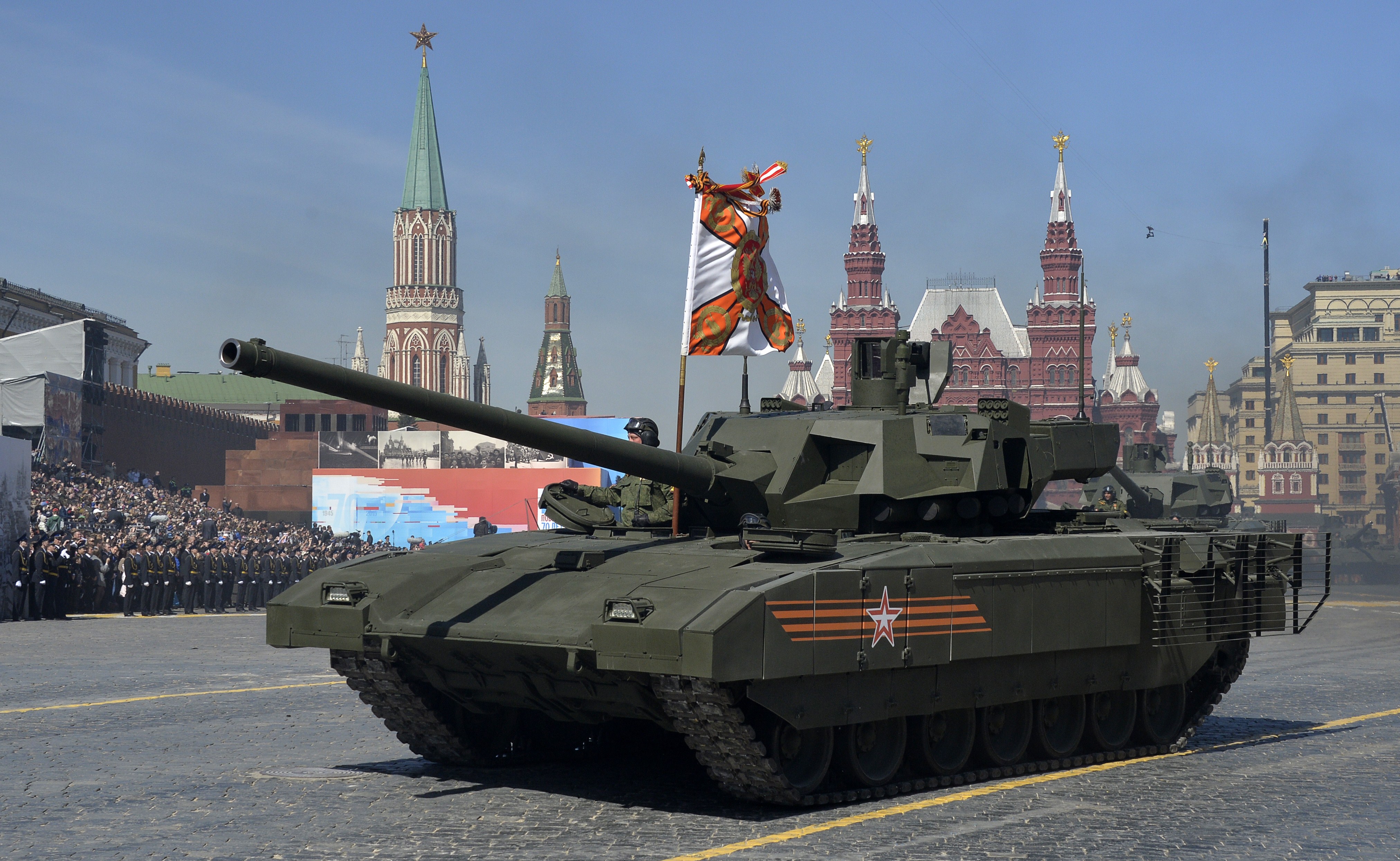 A Russian T-14 Armata main battle tank rides through Red Square in Moscow on May 7, 2015, during a rehearsal for the Victory Day military parade. 