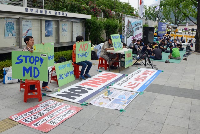 South Koreans outside of the U.S. Embassy in Seoul demonstrate against a proposed THAAD missile system. While South Korea relies on U.S. goodwill, it still occasionally tries to find ways to strengthen its own military, outward diplomacy and security. 