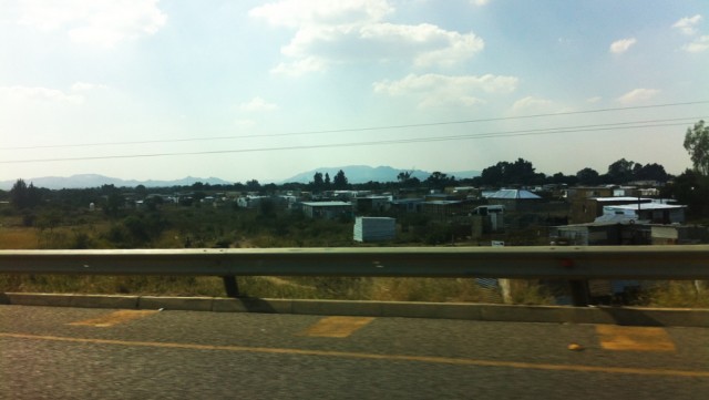 Shantytowns line the road from Johannesburg to Pilanesberg National Park. 