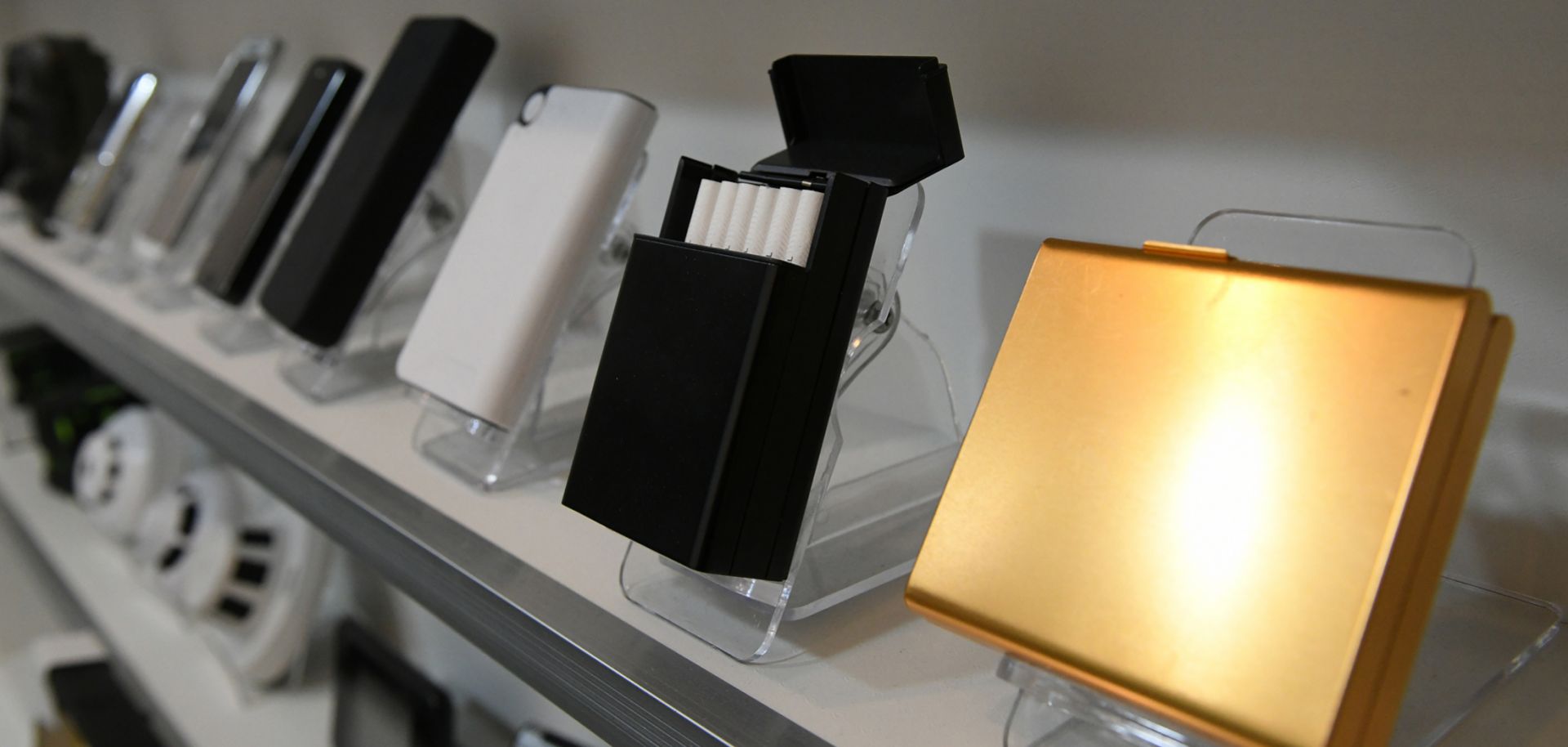 A shop in South Korea displays cigarette cases equipped with hidden cameras, among a wide selection of other spy cam devices.