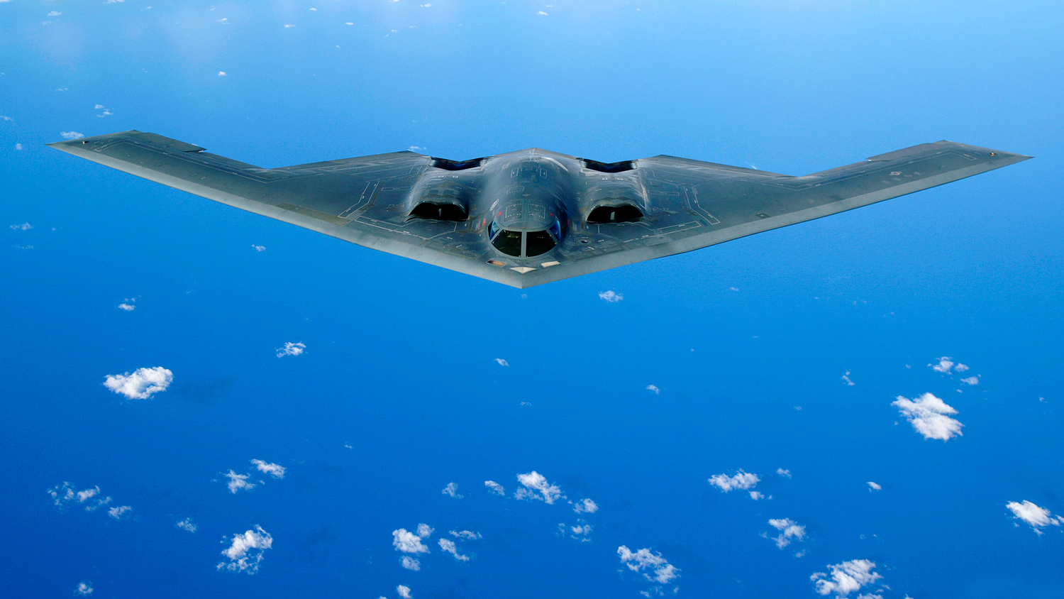 A B-2 Spirit from the 509th Bomb Wing at Whiteman Air Force Base, Mo., flies over the pacific ocean.
