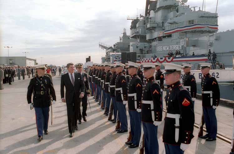 President Reagan reviews troops in front of the USS New Jersey. Underlying his policies was the recognition that American exceptionalism derived not only from its being powerful, but from its responsibility to spread the American system to other countries.