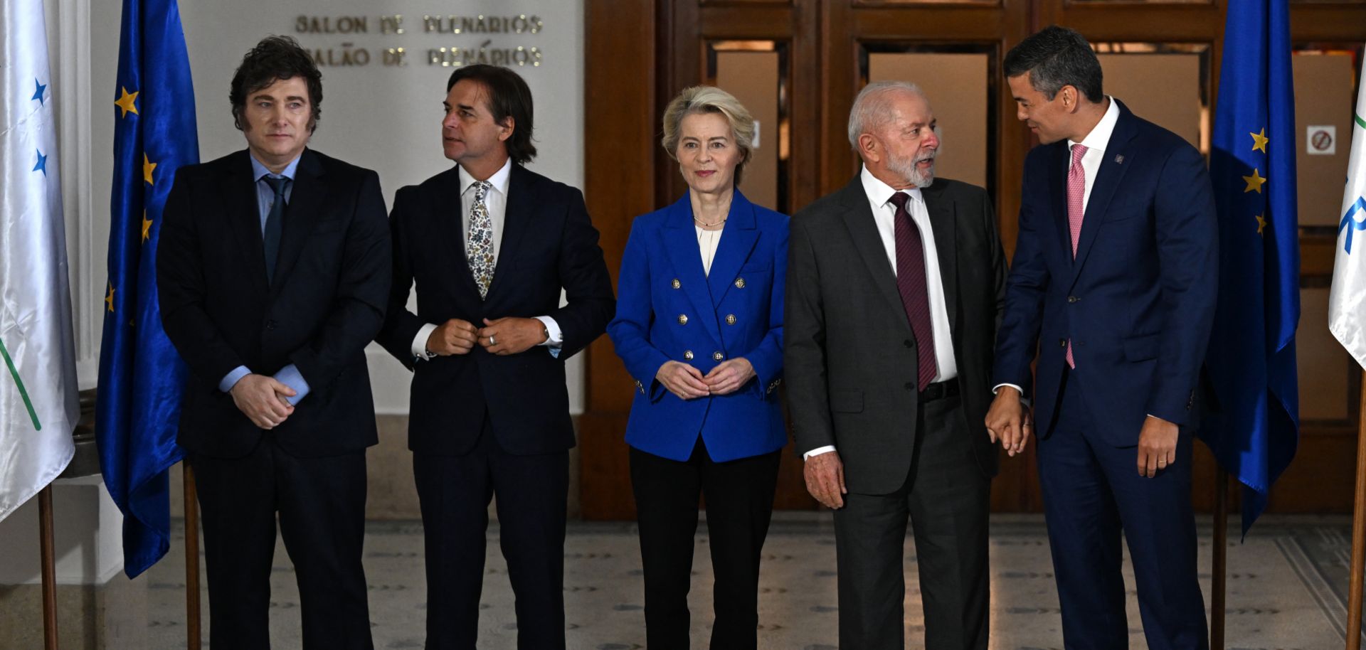 (From left to right) Argentine President Javier Milei, Uruguayan President Luis Lacalle Pou, European Commission President Ursula von der Leyen, Brazilian President Luiz Inacio Lula da Silva and Paraguayan President Santiago Pena pose for a photo during the Mercosur summit in Montevideo on Dec. 6, 2024.