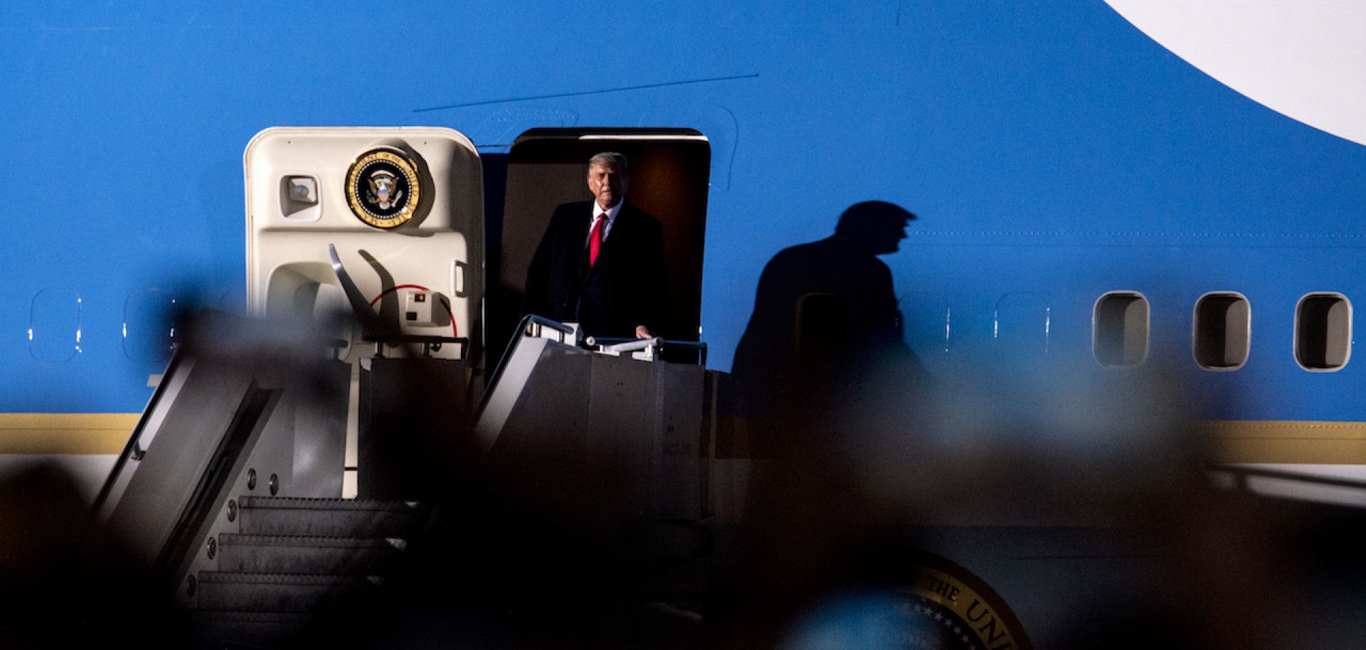 U.S. President Donald Trump exits Air Force One upon arriving in Duluth, Minnesota, for a campaign rally on Sept. 30, 2020. The following night, Trump tested positive for COVID-19.