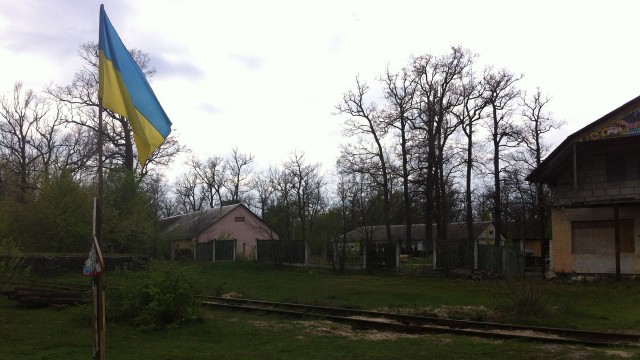 A Ukrainian flag flies in a rural village near Rivne, about 180 kilometers (112 miles) northeast of Lviv. 