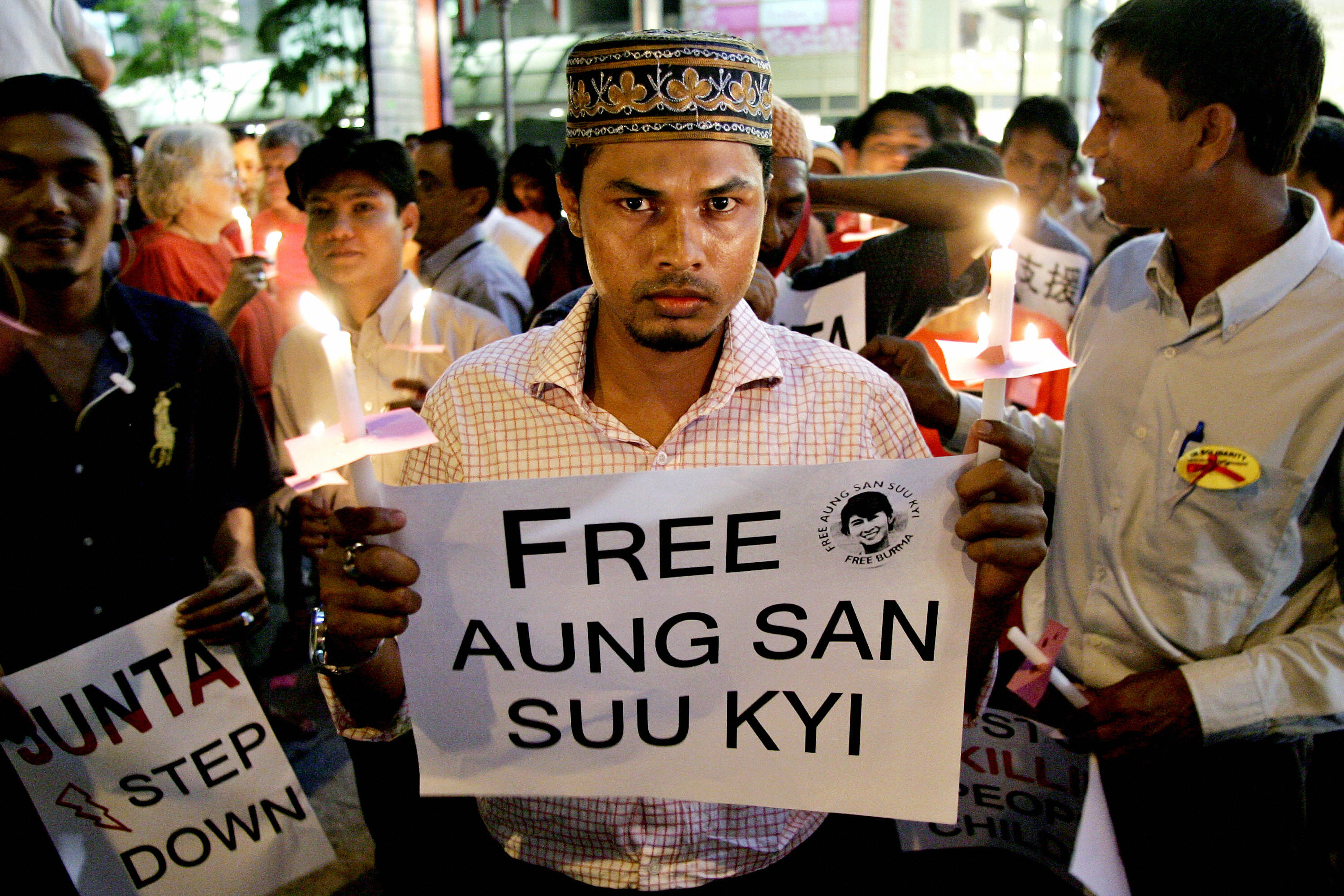 Rohingya activists rallied against the Myanmar military during its longtime dictatorship. An ethnic Rohingya dissident participates in an October 2007 candlelight vigil demanding the release of Aung San Suu Kyi, the democratic icon who largely has been silent about the Rohingya.