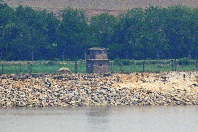 A North Korean guard booth stands along the water across from the South Korean island of Ganghwado. Even though Ganghwado is close to Seoul, it is no bustling metropolis.