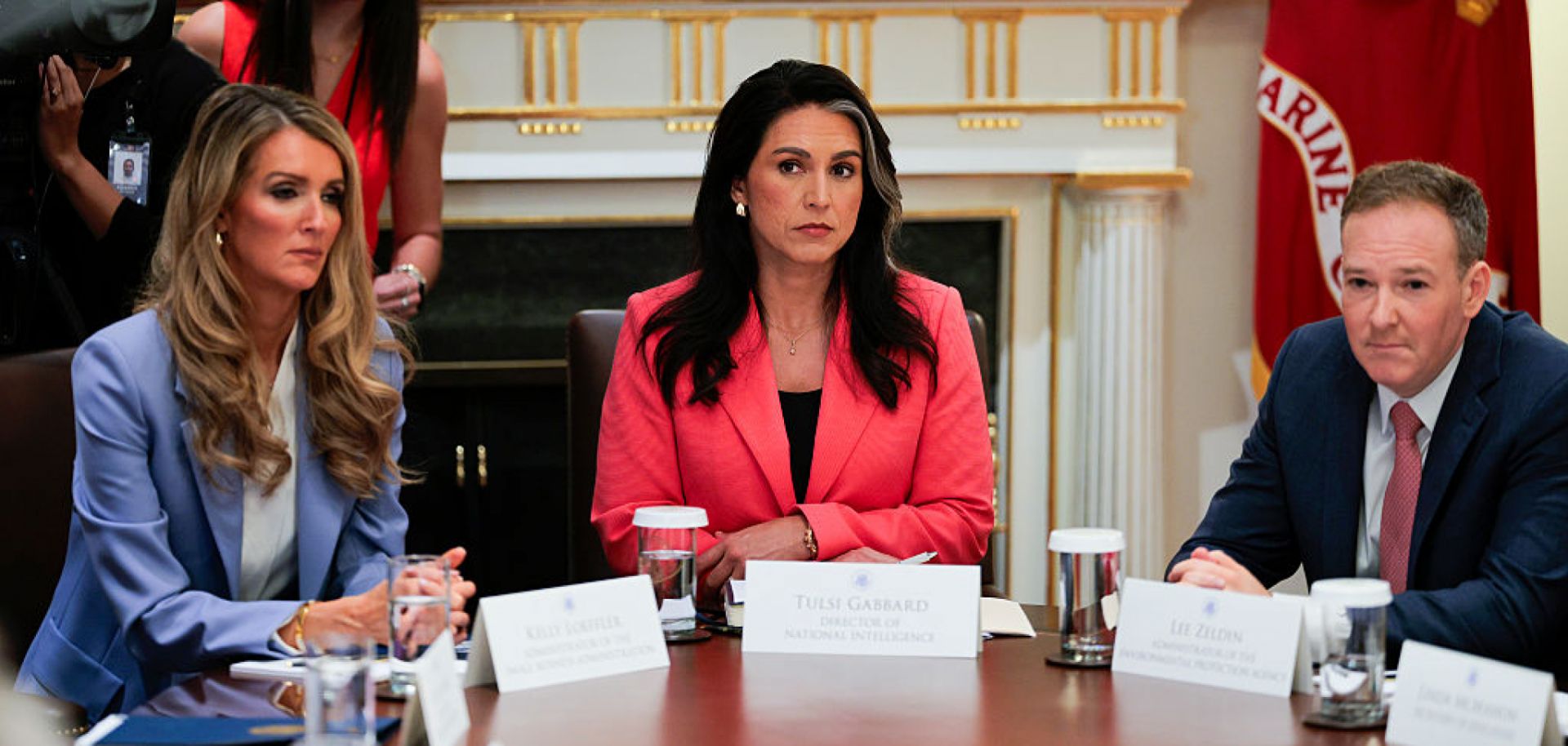 From left to right, Small Business Administration administrator Kelly Loeffler, U.S. Director of National Intelligence Tulsi Gabbard and Environmental Protection Agency administrator Lee Zeldin listen as U.S. President Donald Trump speaks during a Cabinet meeting on Aug. 26, 2025, in Washington, D.C.