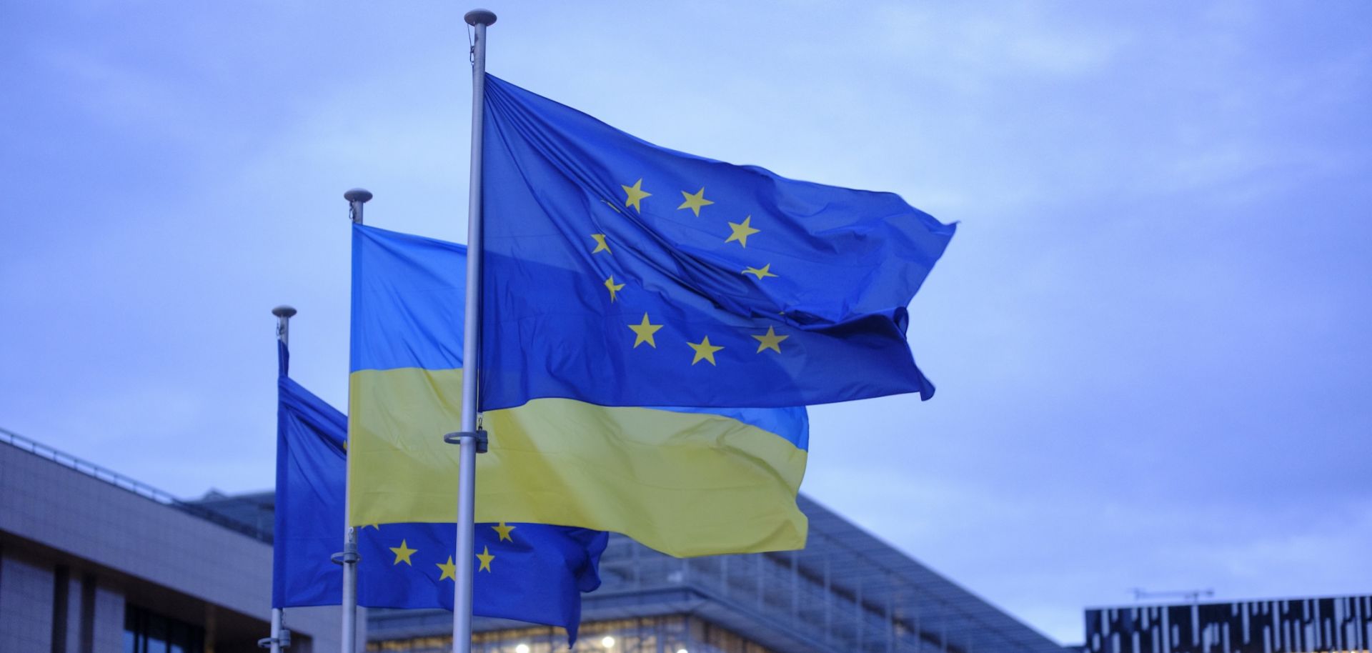 Ukrainian flags are flown alongside EU flags outside the European Commission headquarters in Brussels, Belgium, on Feb. 24, 2025, for the third anniversary of Russia'’s large-scale invasion.