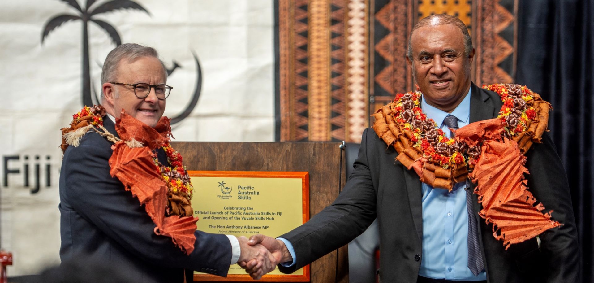 Australian Prime Minister Anthony Albanese (left) and Fiji Minister for Public Works, Transport and Meteorological Services, Ro Filipe Tuisawau (right) shake hands during the opening of the Vuvale Skills hub in Suva on July 6, 2026.