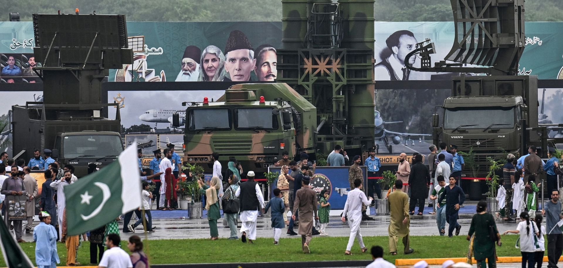 People gather around an army air defense system on display at a military exhibition in Islamabad, Pakistan, on Aug. 14, 2025.