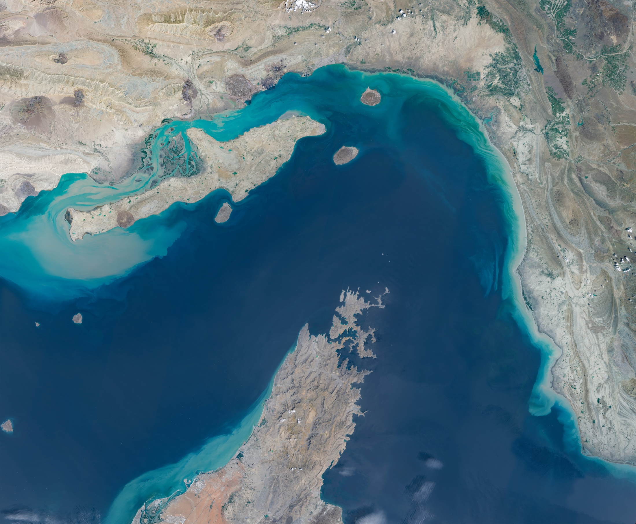 Satellite imagery shows a broad view of the Strait of Hormuz between southern Iran and Oman