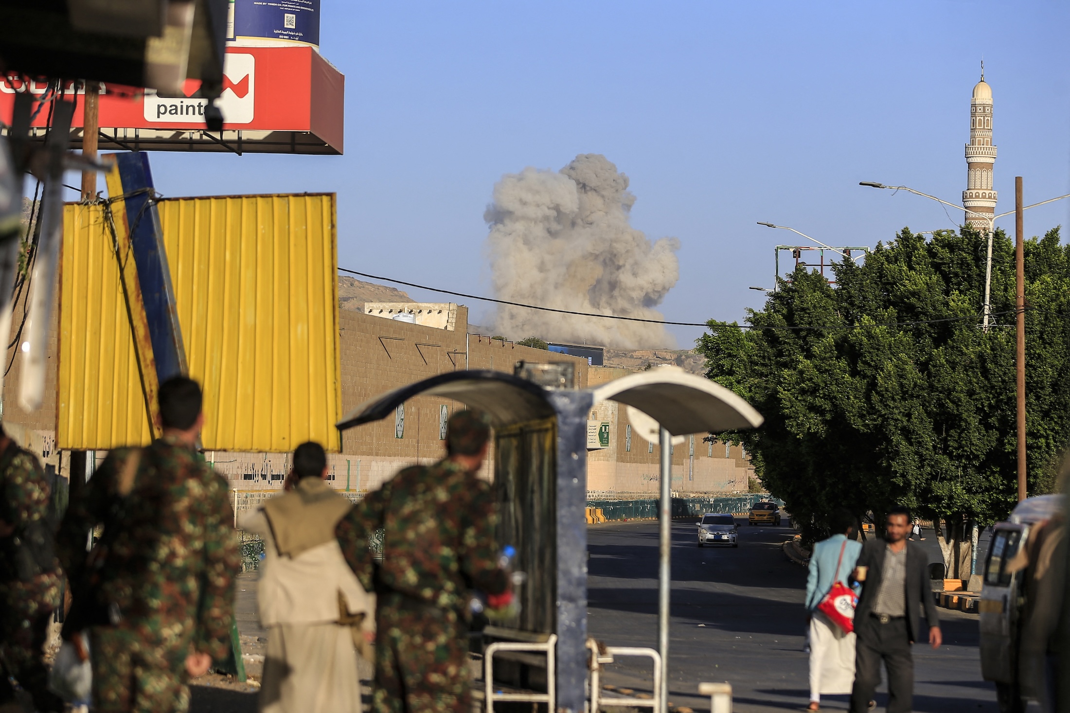 A plume of smoke rises during a reported airstrike by the Saudi-led coalition on the Houthi-controlled Yemeni capital of Sanaa on Oct. 9, 2026.
